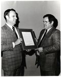 President Stewart Being Presented with an Award by University of Texas at Tyler