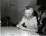 Student Cherie Sehton Playing Cards in the Student Center by University of Texas at Tyler